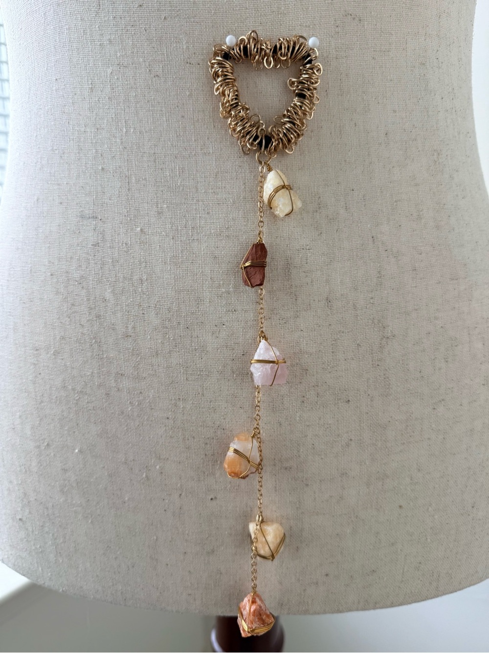 Ariana Ost Gold Wire Hair Band with Rose Quartz and Carnelian Crystals.